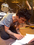 Billie Joe reading his setlist sheet